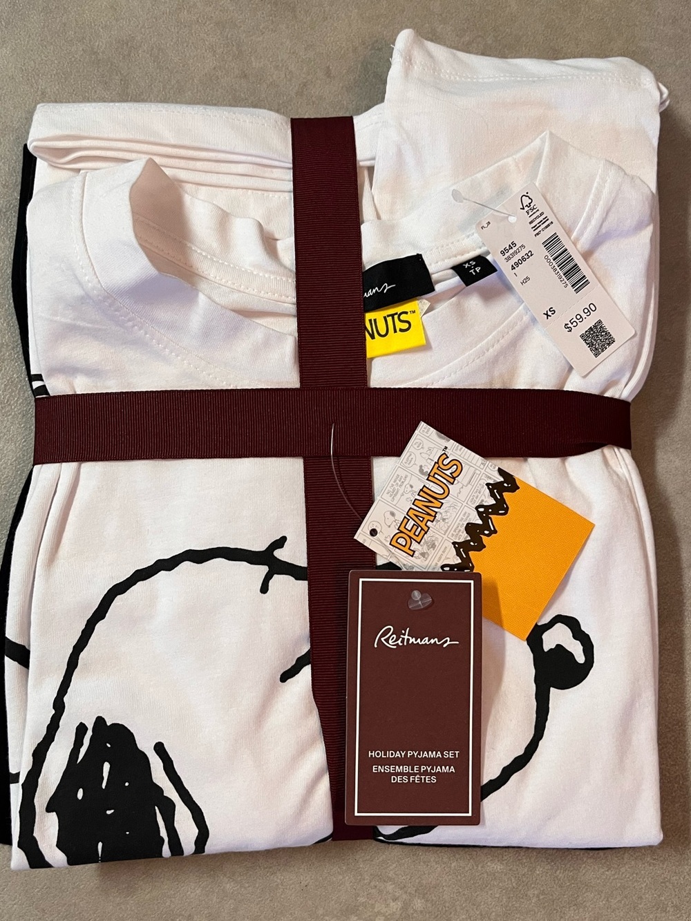 New Peanuts PJs top and pants with drawstring. XS. NWT
Retails $59